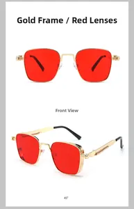 Detailed view of vintage square sunglasses with gold metal frame and red tinted lenses