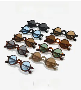 Macro view of vintage round frame steampunk sunglasses in multiple color options