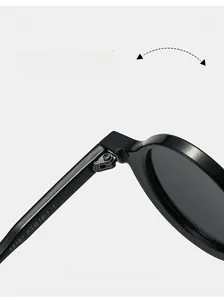 Macro shot of durable textured hinge on vintage round frame sunglasses showing 13181 model code