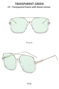 Close-up of square double-bridge sunglasses with transparent frame and green lenses