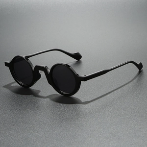Retro black round sunglasses with premium resin frames and dark lenses for men and women