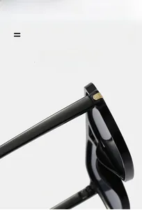 Detail of premium metal hinge on lightweight black square sunglasses with elastic frame