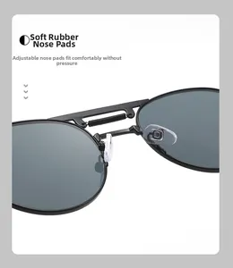 Detail of adjustable transparent soft silicone nose pads on black metal sunglasses