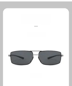 Vue de face de lunettes de soleil rectangulaires en métal gris avec verres gris