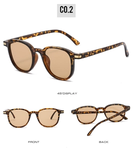 Detailed views of tortoise shell oval sunglasses with brown lenses and gold metal accents