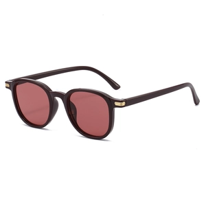 Retro oval sunglasses with dark red frames and golden metal accents for men and women
