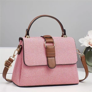 Elegant red and white tweed tote bag with brown leather straps and gold metal hardware