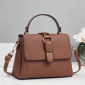 Brown contrast print tote bag with gold ring buckle and adjustable shoulder strap