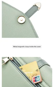 Détail du sac en cuir vert clair avec boucle magnétique et poche zippée à l'arrière