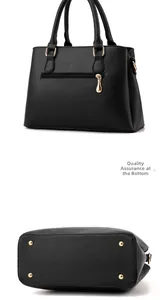 Vue arrière et fond du sac à main en cuir noir avec clous dorés et fermeture éclair