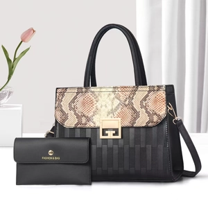 Black snake pattern patchwork tote bag set with golden G-buckle and matching wallet
