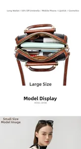 Detail view of the interior capacity and croc-embossed texture on this stylish handbag