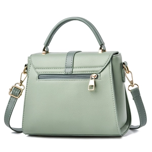 Petit sac à main vert clair avec poignée supérieure et bandoulière amovible