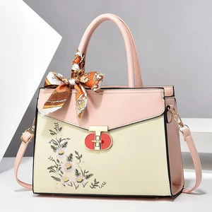 Pink and cream PU leather handbag with floral embroidery and silk scarf on handle