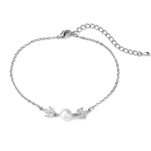 Detailed view of silver leaf bracelet with white pearl and zircon stones with lobster clasp