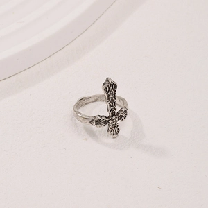 Vintage silver cross ring with intricate floral engraving and minimalist textured design