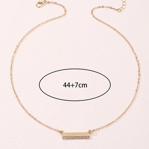 Gold-tone bar pendant necklace with small zircon stones and 44cm chain length