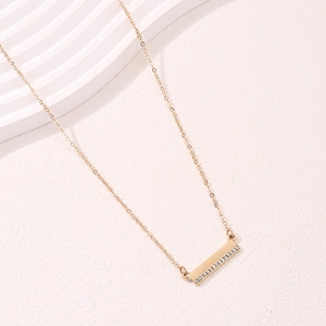 Elegant gold bar necklace for women featuring a minimalist rectangle pendant with zircons