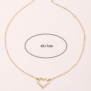 Golden mosaic pixel heart pendant necklace with thin chain and adjustable length
