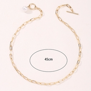 Collier chaîne trombone doré avec perle et fermoir à bascule, design minimaliste 45cm