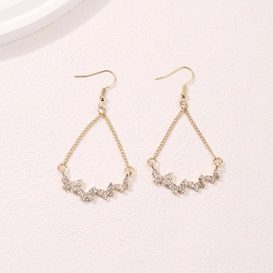 Elegant gold butterfly tassel earrings with sparkling rhinestones in a modern design