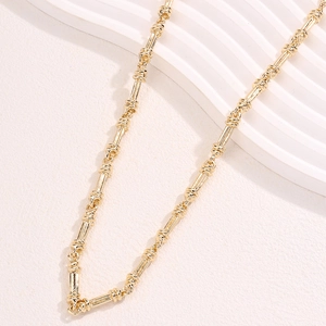 Minimalist gold alloy link necklace featuring stylish bamboo-style tubular chain design