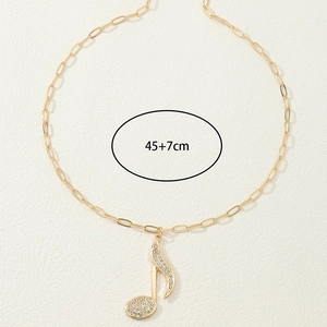 Collana nota musicale dorata con strass e catena a graffetta lunghezza 45+7cm