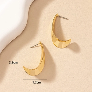 Polished gold geometric earrings measuring 3.8cm by 1.2cm in a stylish crescent design