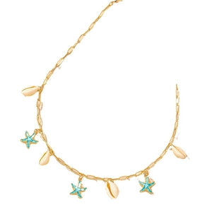 Gold chain necklace with blue starfish and white shell charms for a summer beach look