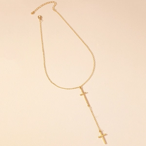 Minimalist gold Y-shaped necklace with double cross pendants and dainty chain links
