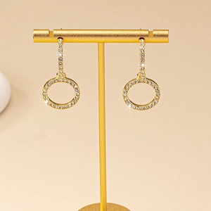 French retro gold circle drop earrings with shimmering micro-pave crystals on T-stand