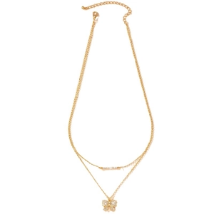 Elegant gold double-layered necklace featuring a sparkling diamond-encrusted bow pendant