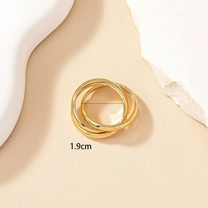 Close-up of three-in-one gold layered ring showing 1.9cm inner diameter size detail