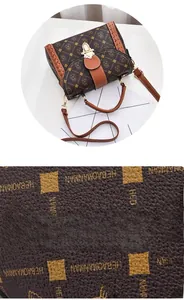 Detail of vintage brown monogram handbag with premium textured leather and woven edges