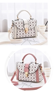 Close-up of contrast woven details and gold metal buckle on cute cartoon crossbody bag