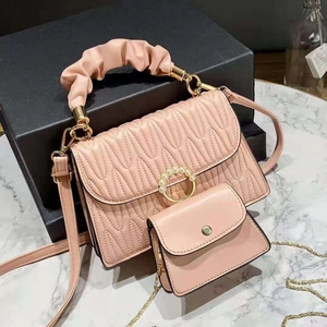 Pink embossed PU leather crossbody bag with pleated handle and pearl ring buckle