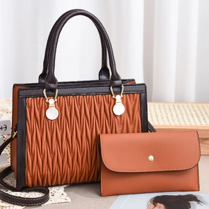 Brown leather handbag set with V-shaped pleats, including a tote and matching wallet
