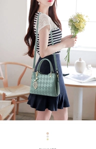 Chic mint green crossbody bag featuring diamond quilting and metallic leaf pendant charm