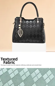 Detailed view of the diamond-quilted texture and gold hardware on a leather handbag