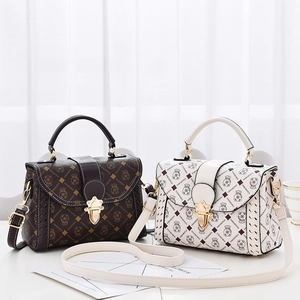 Cartoon pattern woven contrast color crossbody bag with top handle and gold hardware