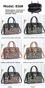 Detail view of leopard print tote bag with multi-compartment structure and gold hardware