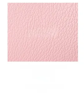 Macro shot of pink litchi grain leather texture and polished electroplated hardware