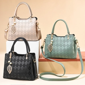 Diamond quilted large capacity shoulder bag for women with leaf charm in multiple colors