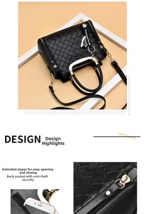 Detail of woven texture black shoulder bag featuring gold hardware and anti-theft back pocket