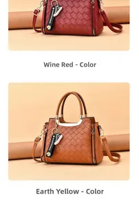 Close-up of woven texture handbags in burgundy and yellow with gold metal handles