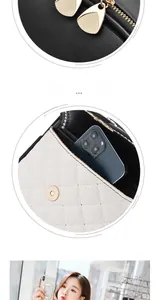 Detail of color-block backpack showing zipper pull, magnetic pocket, and phone storage