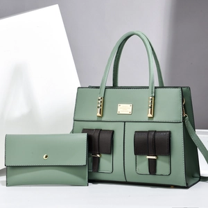 Mint green textured faux leather tote bag and wallet set with brown pockets