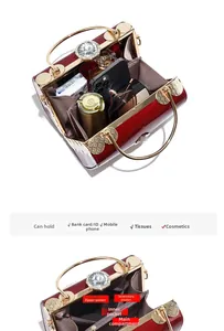 Internal compartments of the red evening bag showing storage for phone and makeup