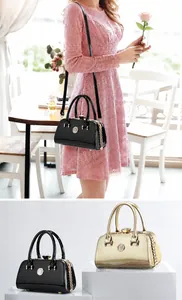 Drei elegante Clutch-Taschen aus Lackleder in Schwarz, Champagnergold und Dunkelblau