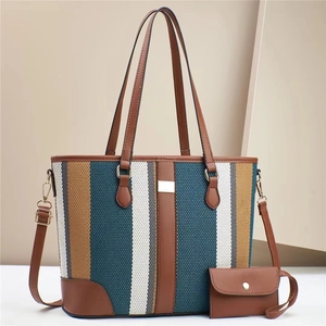 Minimalist canvas tote bag with contrast stitching and matching small pouch